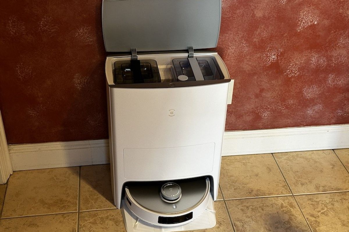 a photo of Ecovacs DEEBOT T20 OMNI Robot Vacuum and Mop installed in a kitchen