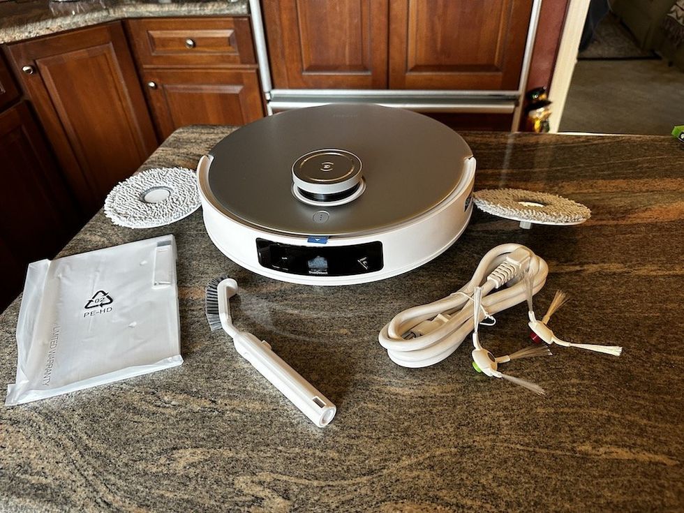 a photo of Ecovacs DEEBOT T20 OMNI Robot Vacuum and Mop unboxed