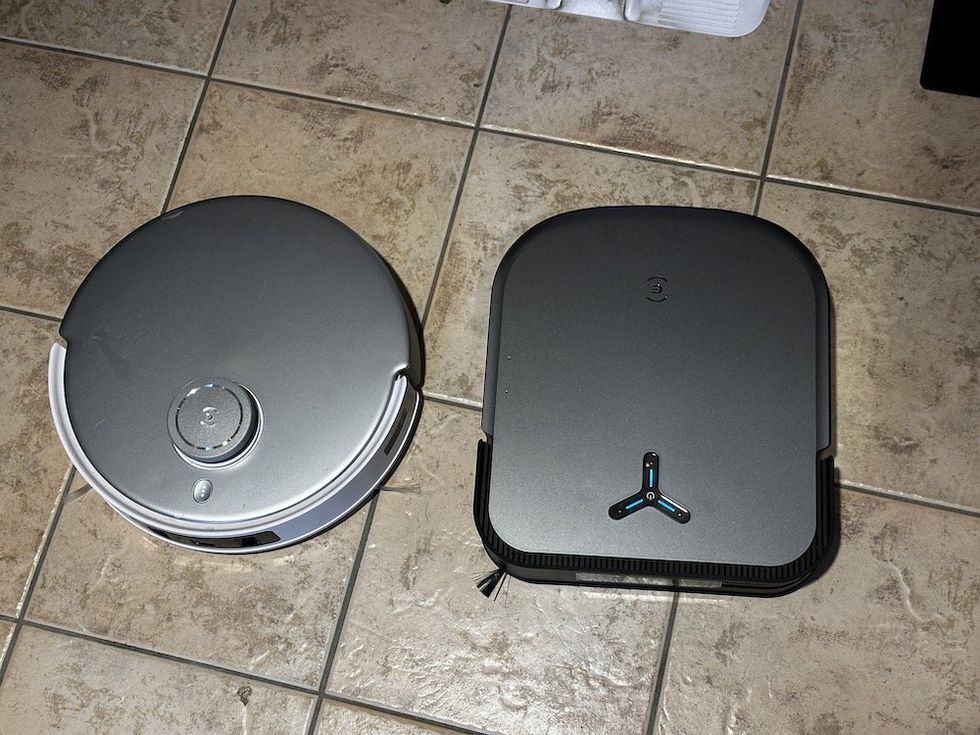 a photo of DEEBOT T20 and X2 robot vacuums next to each other