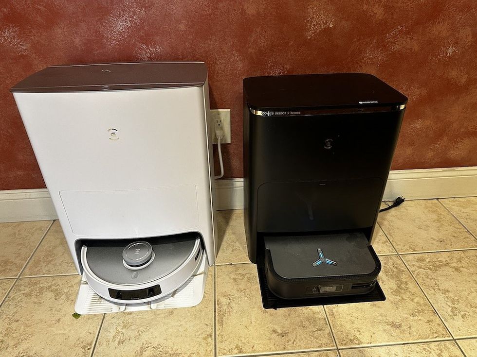a photo of the Deebot T20 and X2 Omni stations next to each other