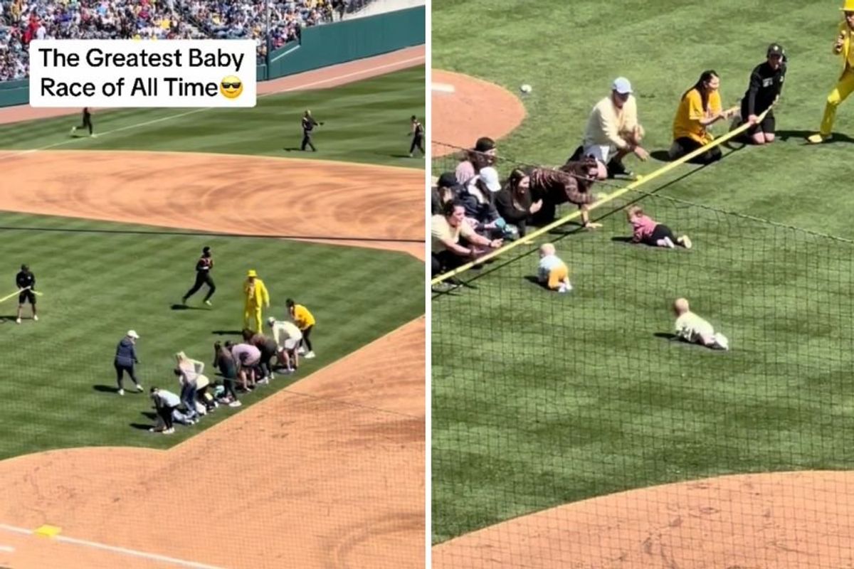 babies crawling across a baseball field