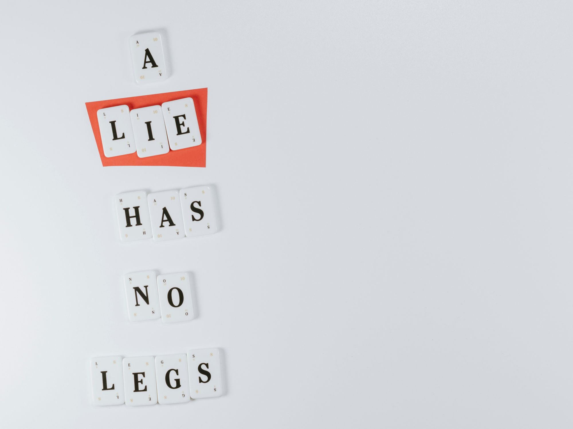 image with the phrase "a lie has no legs"