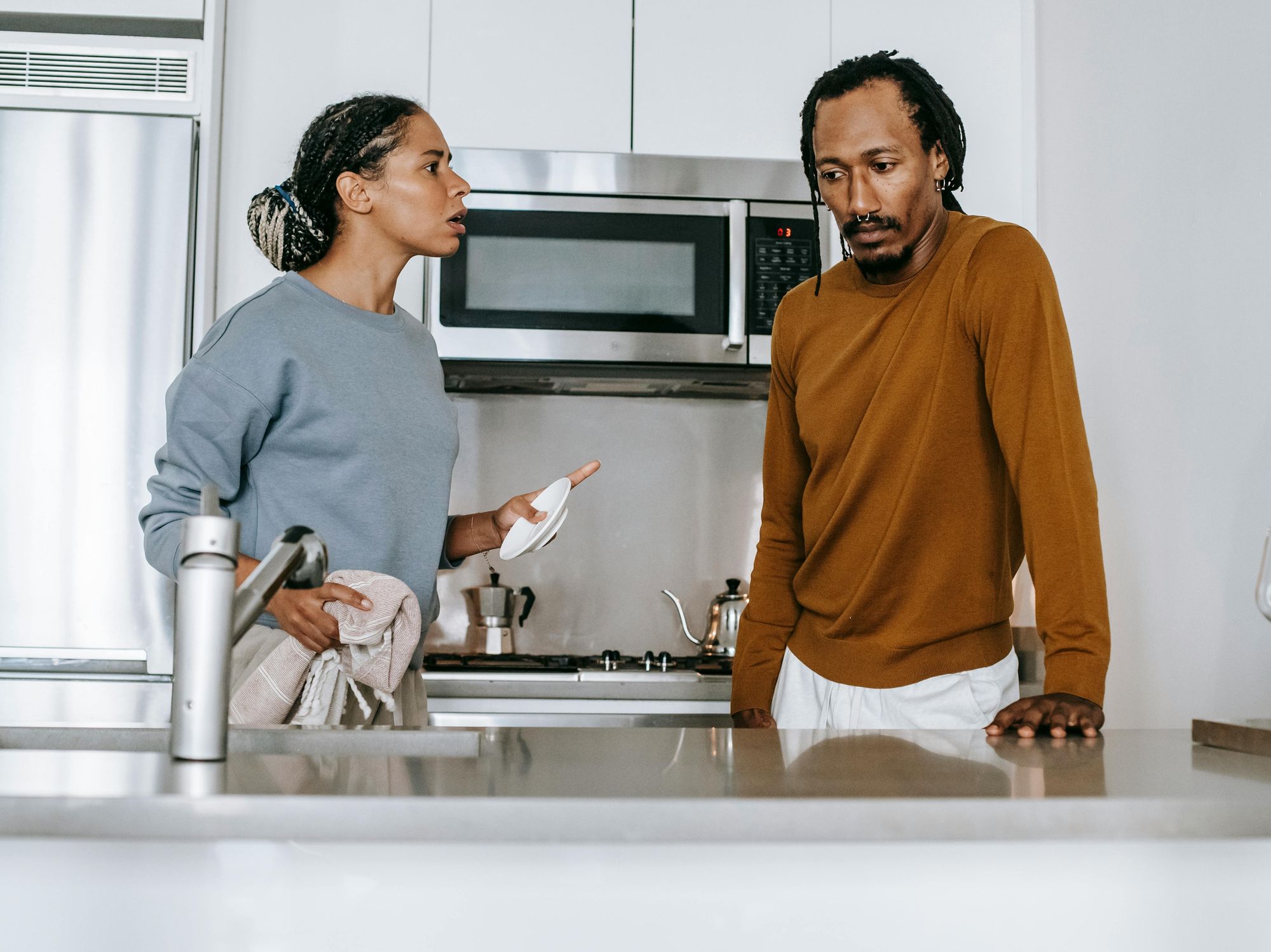 couple arguing in the kitchen