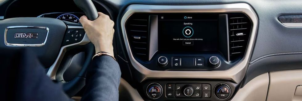 a photo of GMC dashboard showing Alexa voice activation