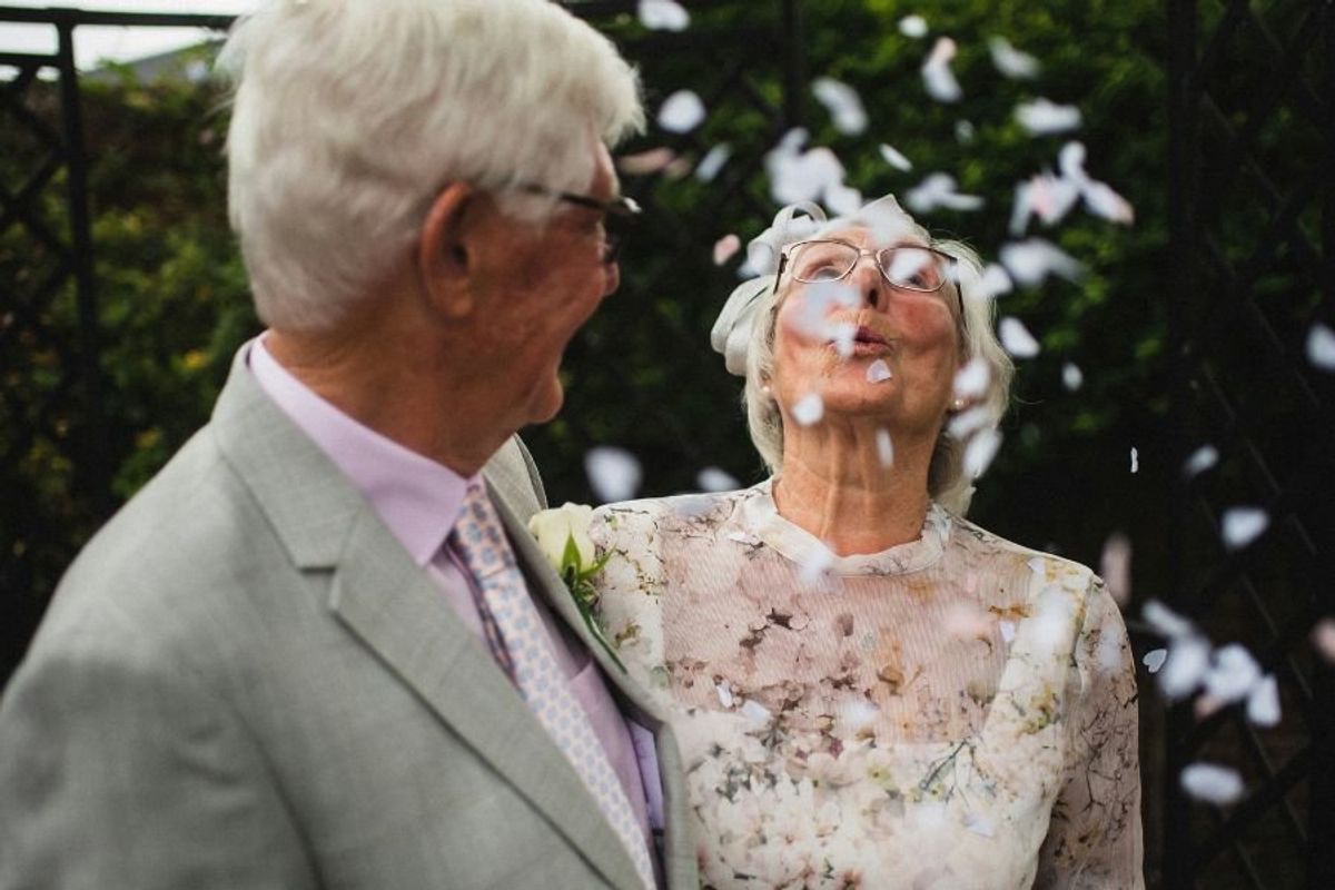 old couple dressed as if at a wedding