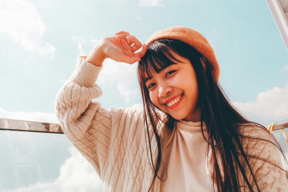 woman smiling and looking at the camera