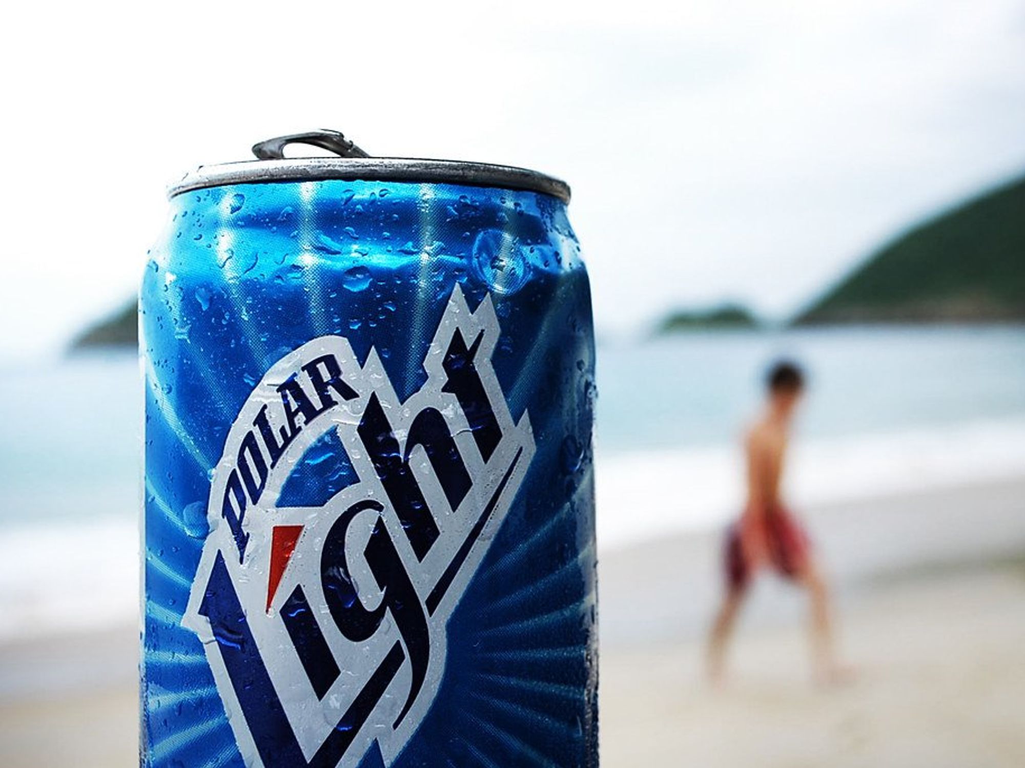 Venezuelan 'Polar' beer against the backdrop of a Caribbean beach