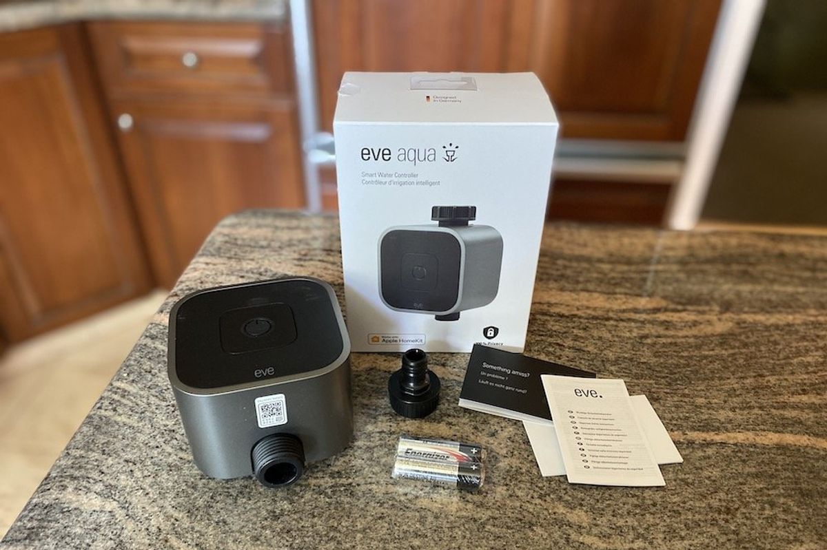 a photo of Eve Aqua Smart Water Controller unboxed on a countertop