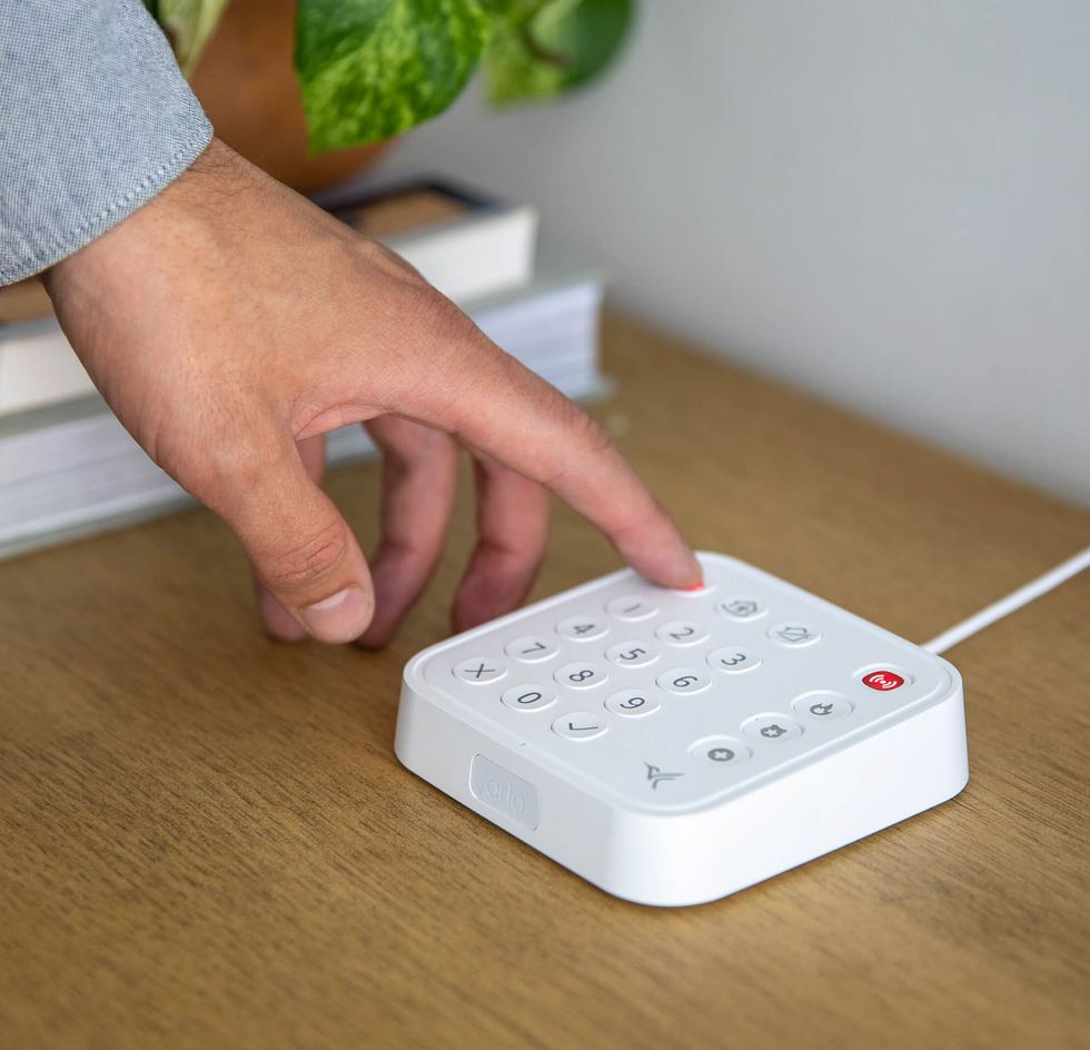 a photo of Arlo total security sensor hub