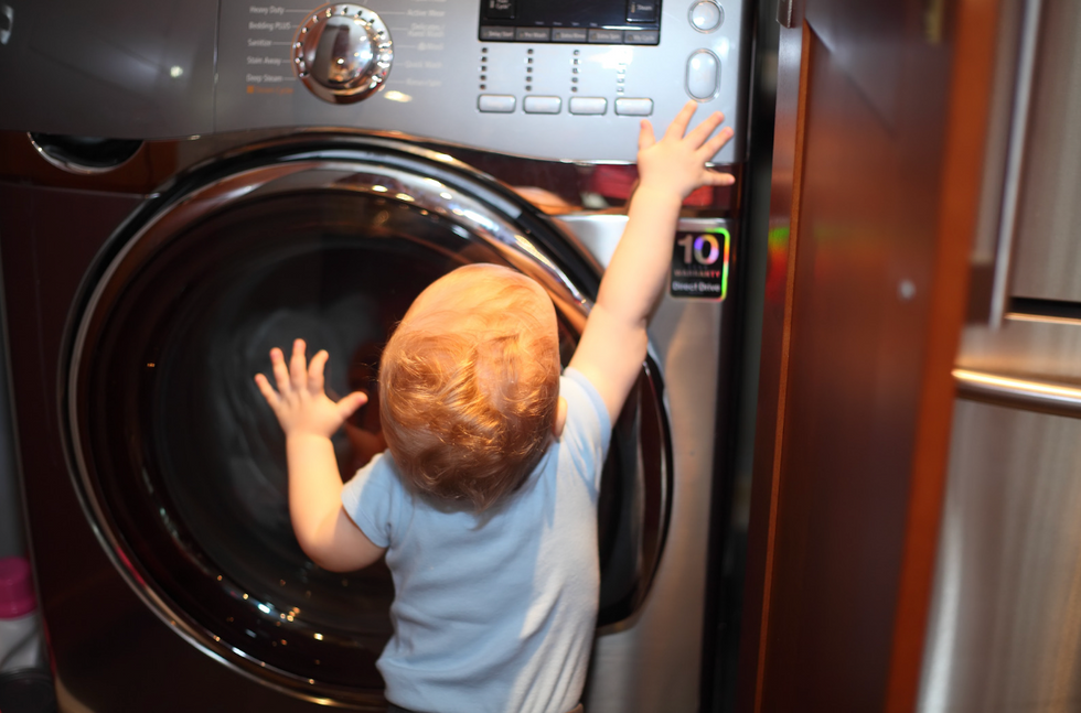 Mom films her 10-month-old helping with chores to show parents that babies &apos;are capable&apos;