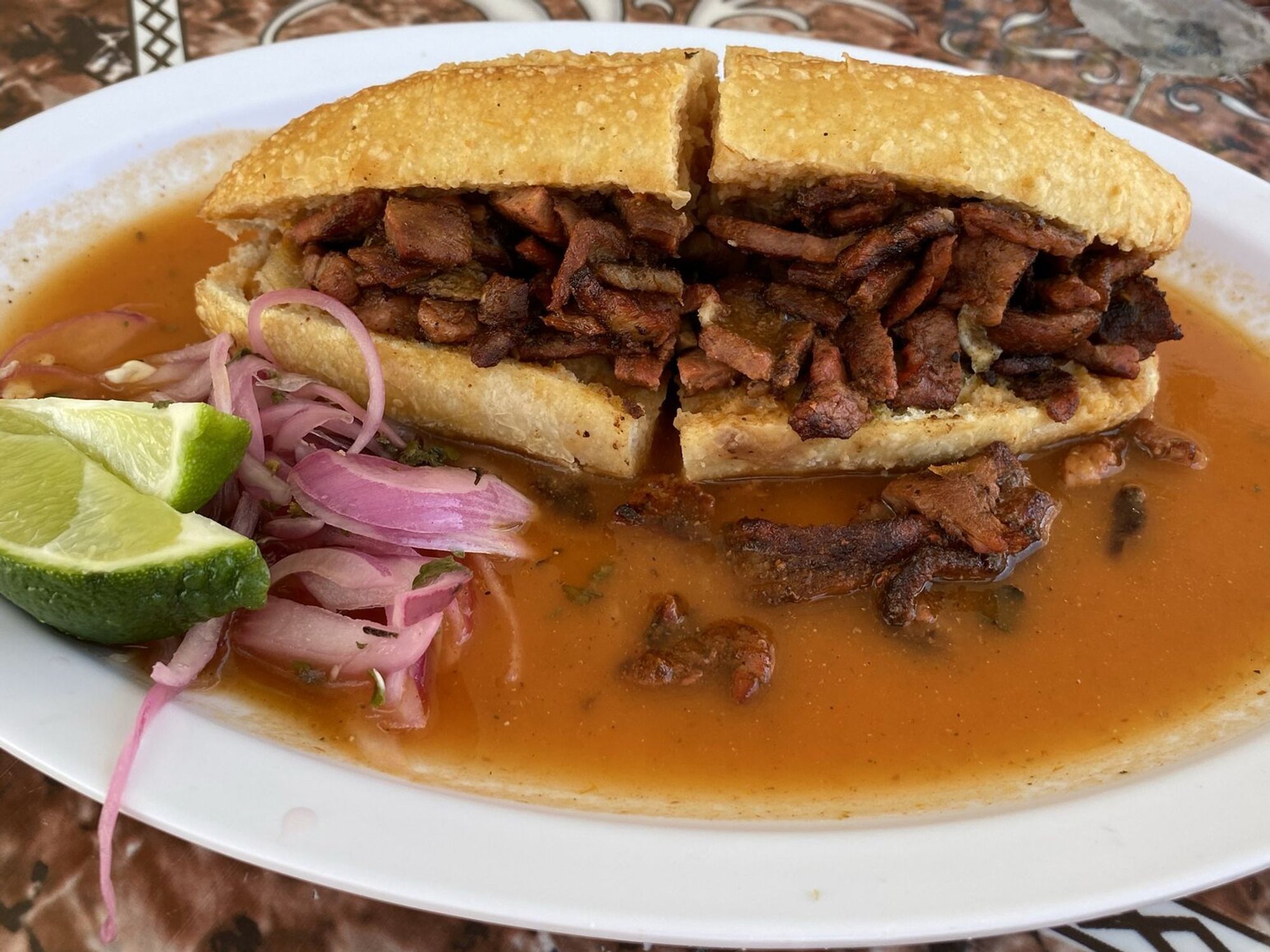 plate of "torta ahogada" Mexican street food