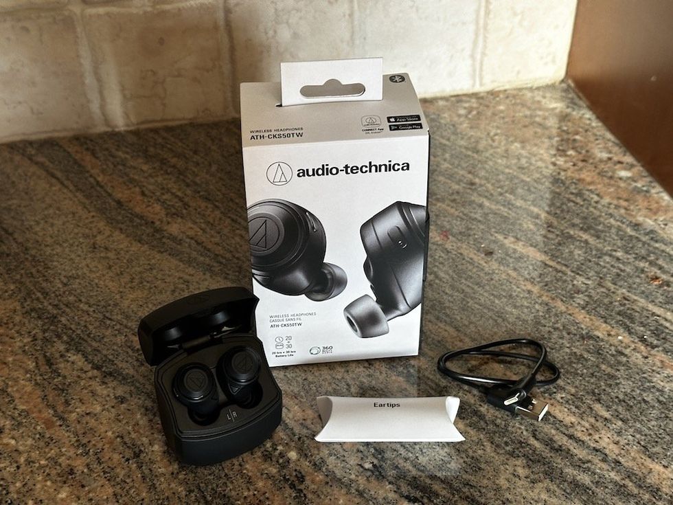 a photo of Audio-Technica ATH-CKS50TW Wireless Earbuds unboxed