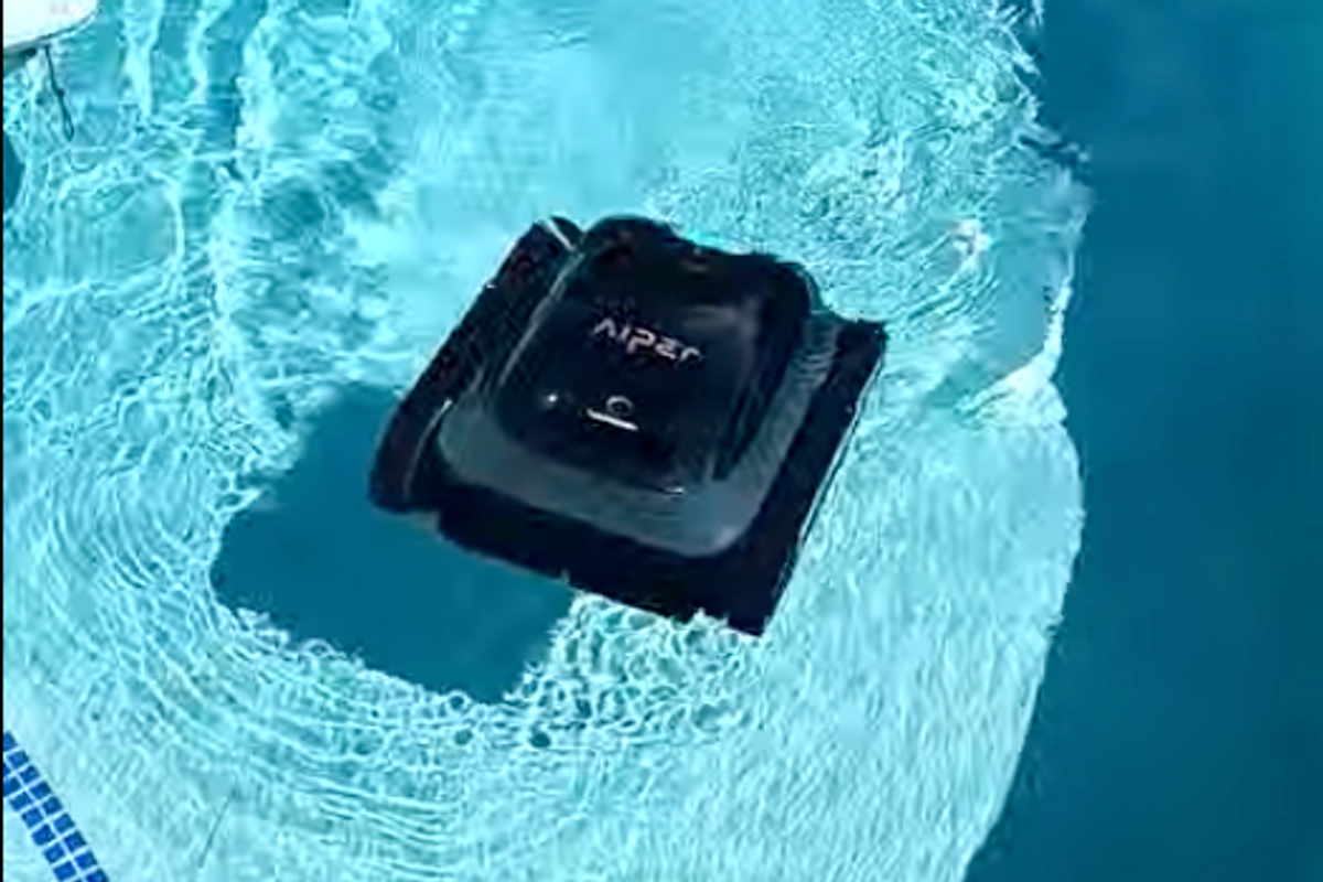 a photo of Aiper Scuba S1 Cordless Robotic Pool Cleaner submerging in a pool