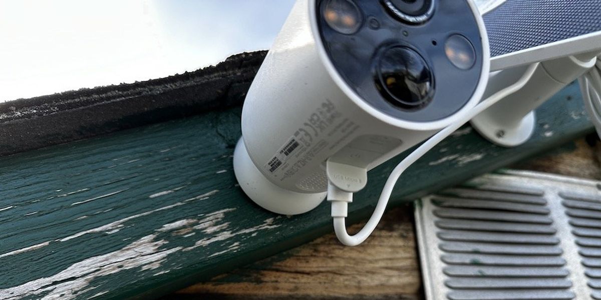 a photo showing the solar panel cable plugged into the TC85 installed on a shed