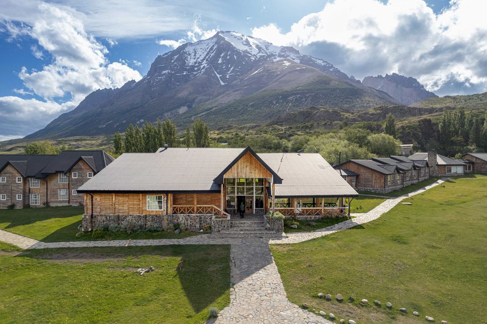 hotel sitting in front of a mountain