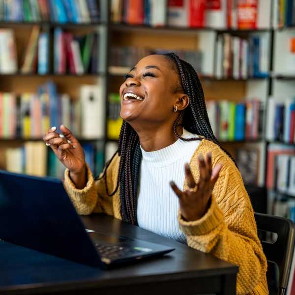 Black-woman-feeling-euphoria-lucky-in-work-career-Jupiter-in-Gemini-horoscopes