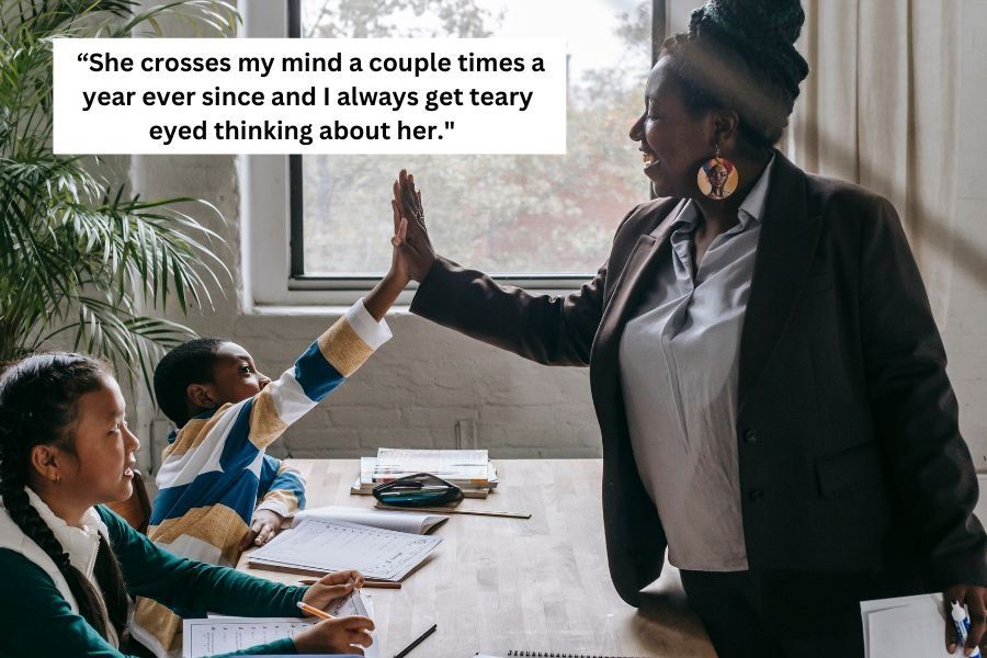 teacher high-fiving a student