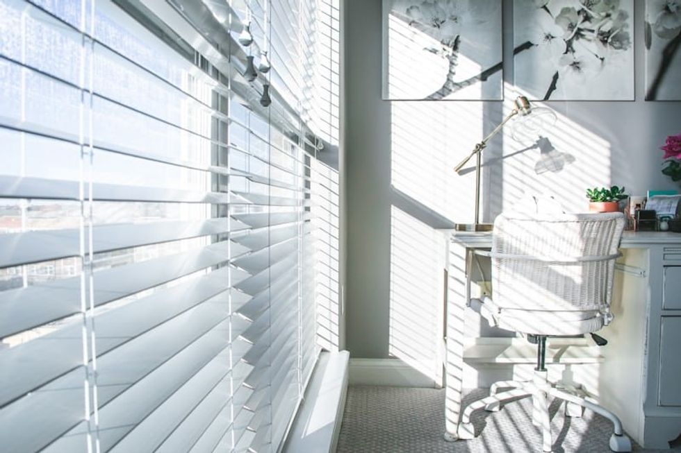 \u200bWhite blinds on a window