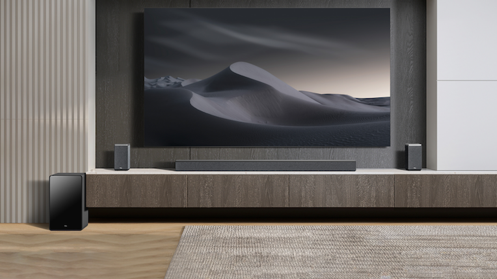 a photo of a room with TCL home theatre and smart tv on display.