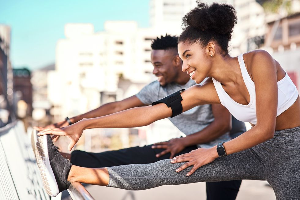 Black couple stretching