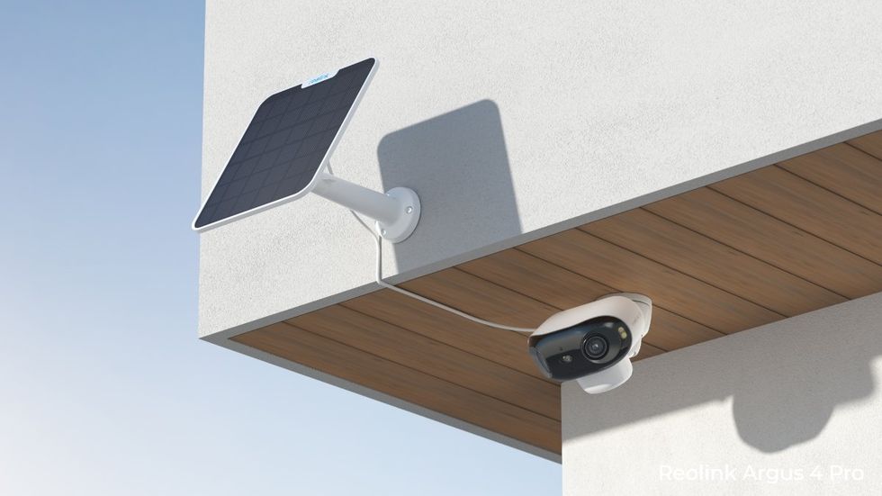a photo of Reolink Argus 4 Pro installed on a house.
