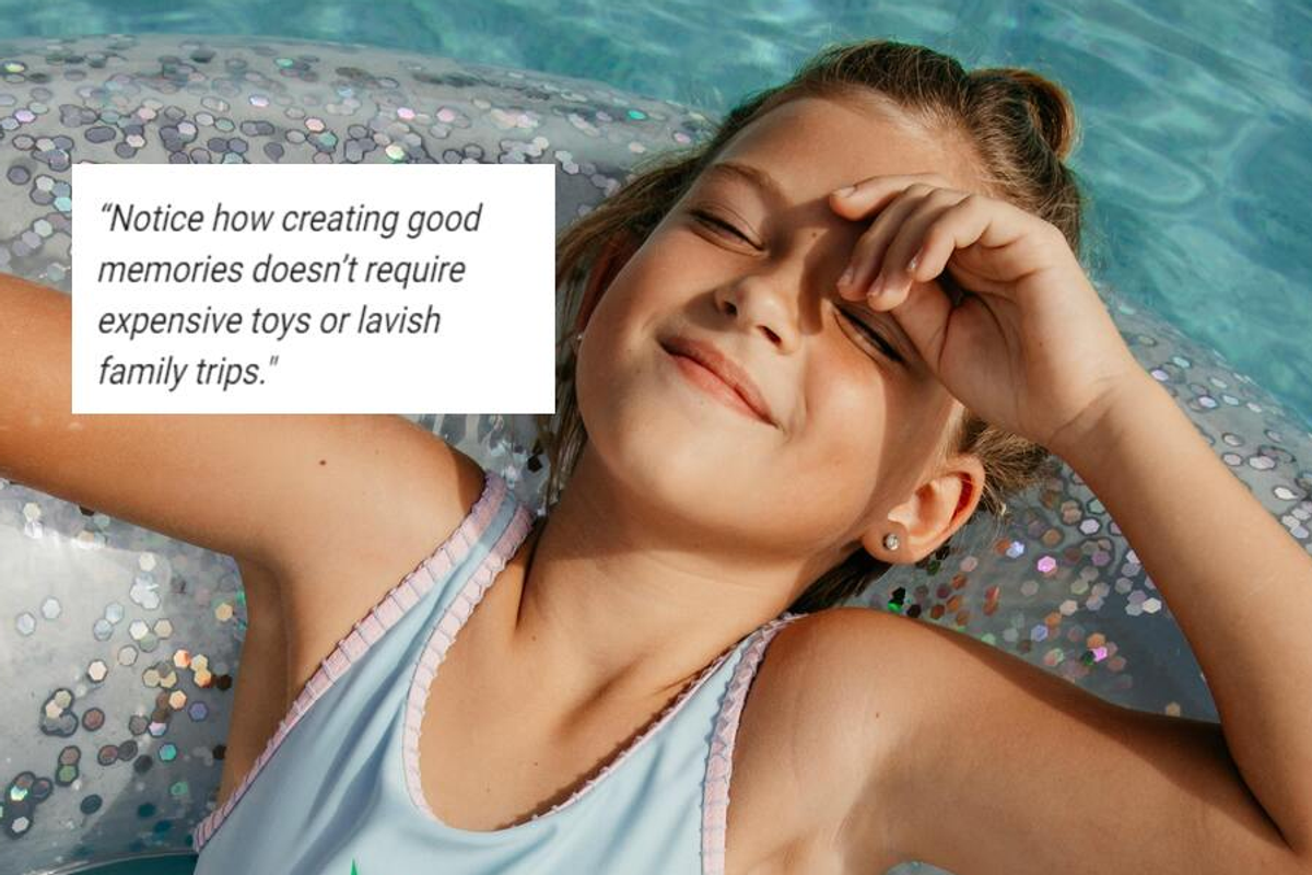 A young girl relaxing in an inner tube.
