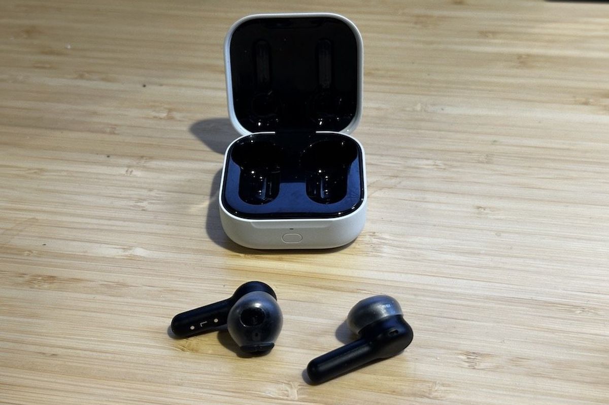 a photo of Amazon Echo Buds (2023 Release) charging case and earbuds