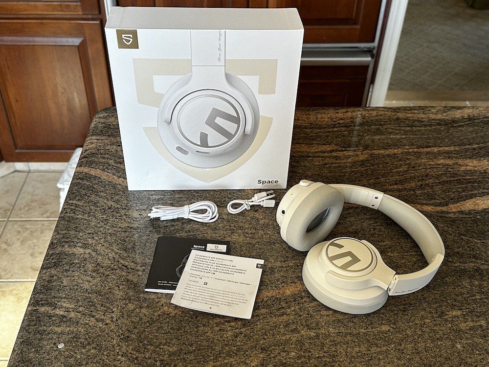 a photo of SoundPEATS Space Over-the-Ears ANC Headphones unboxed on a countertop