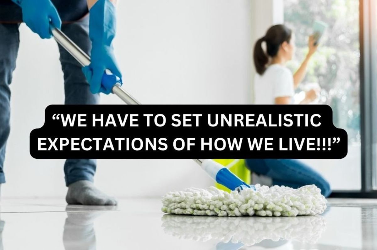 two people cleaning a room