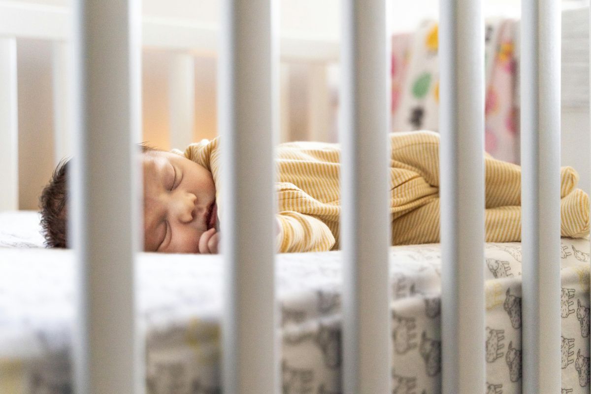 baby sleeping in crib
