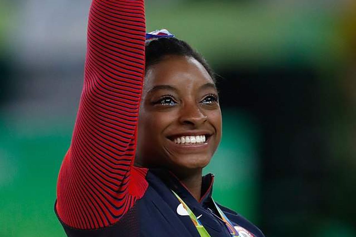 Houston's Simone Biles wins historic 2nd Olympic all-around gymnastics title