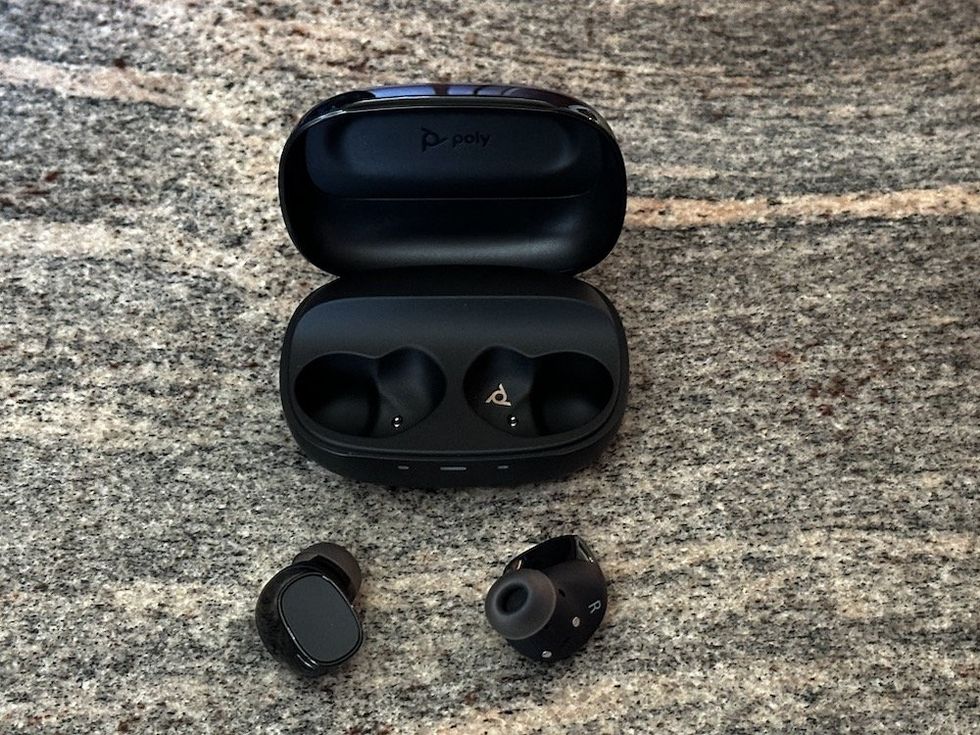 a photo of Poly Voyager Free 20 True Wireless Earbuds and case