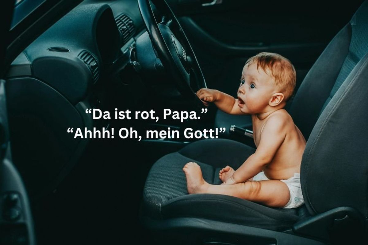 baby in a diaper sits in the driver's seat of a car