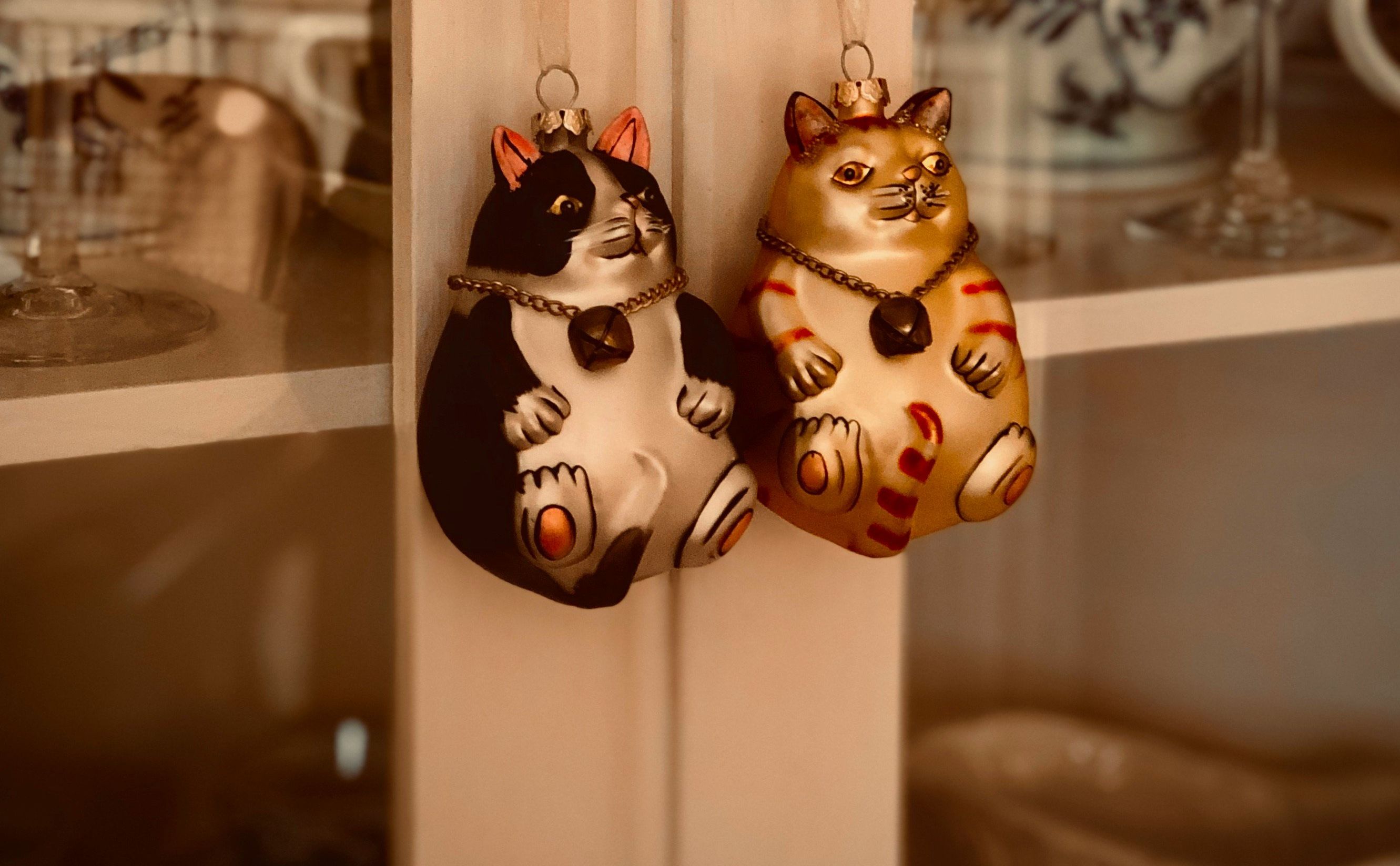 cat decorations hanging on a door