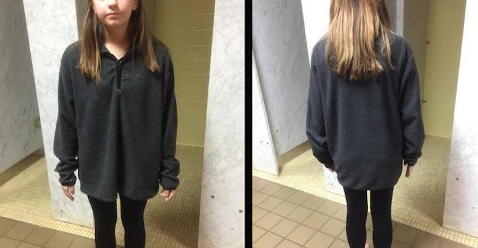 A girl at school wearing loose fitting shirt and black leggings