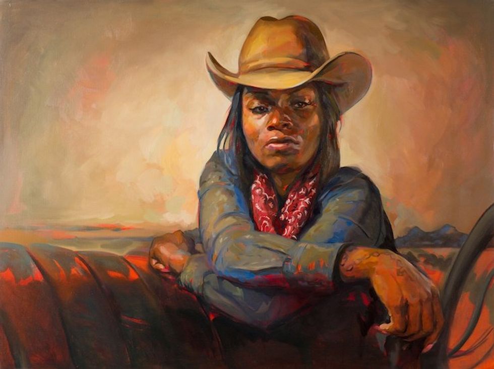 Woman in cowboy hat and red bandana