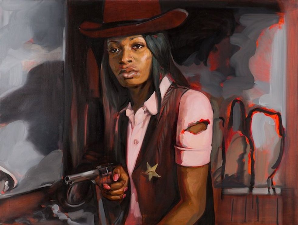 Woman in cowboy hat and Sheriff star holding a pistol