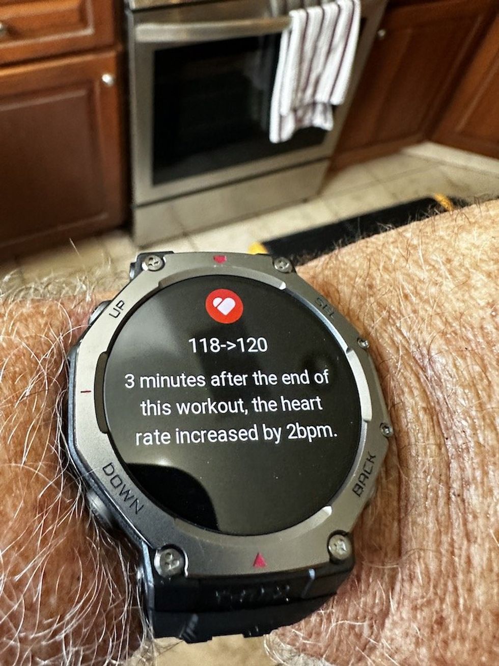 a photo of \u200bAmazfit T-Rex 3 Smartwatch showing information on the heart rate of user after working out.