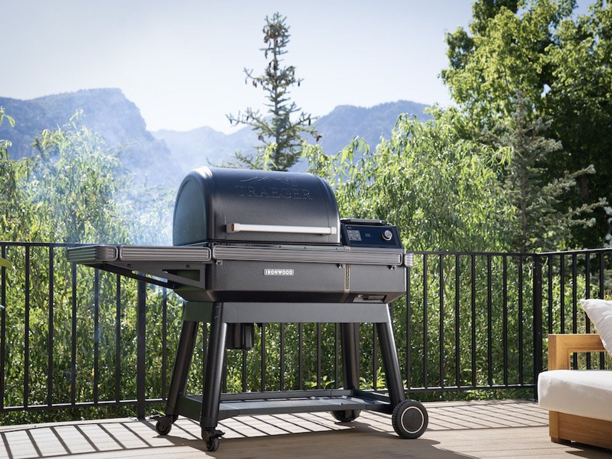 a photo of traeger Ironwood grill on a outside deck