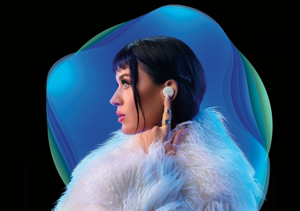 a photo of Katy Perry wearing Denon PerL Earbuds