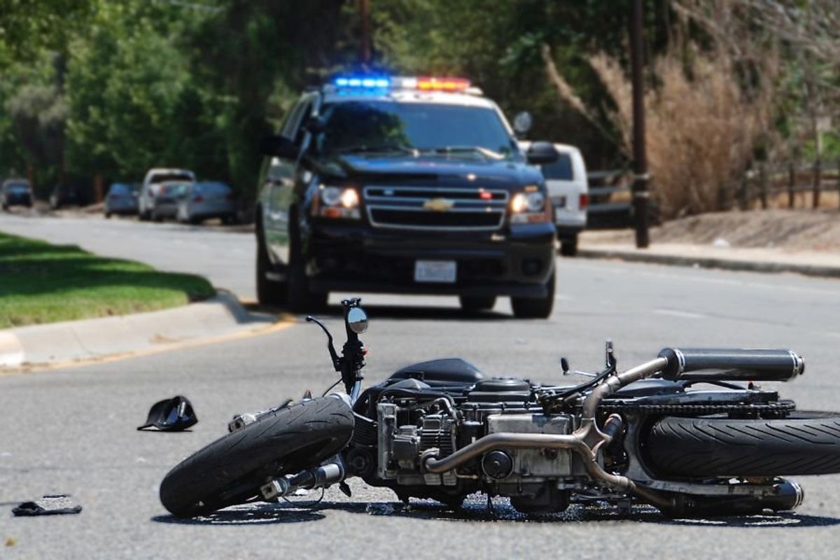 motorcycle accident; mom saves airman; Guam motorcycle accident; woman saves motorcyclist; woman saves man after accident