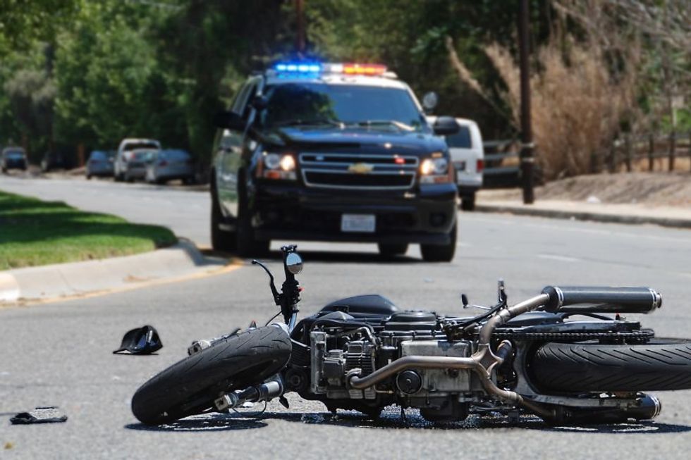 Mom races to help after seeing young man passed out and surrounded by traffic on busy road