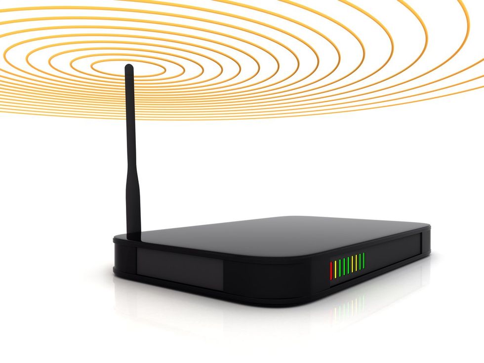 a photo of a modem showing the wireless signal from streaming media across the network.