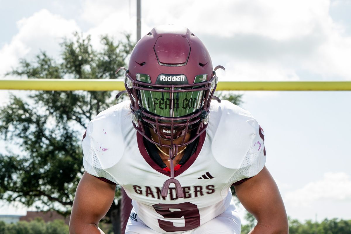 THE FAMILY MAN: Lee's Thompson playing for the name on back of his jersey