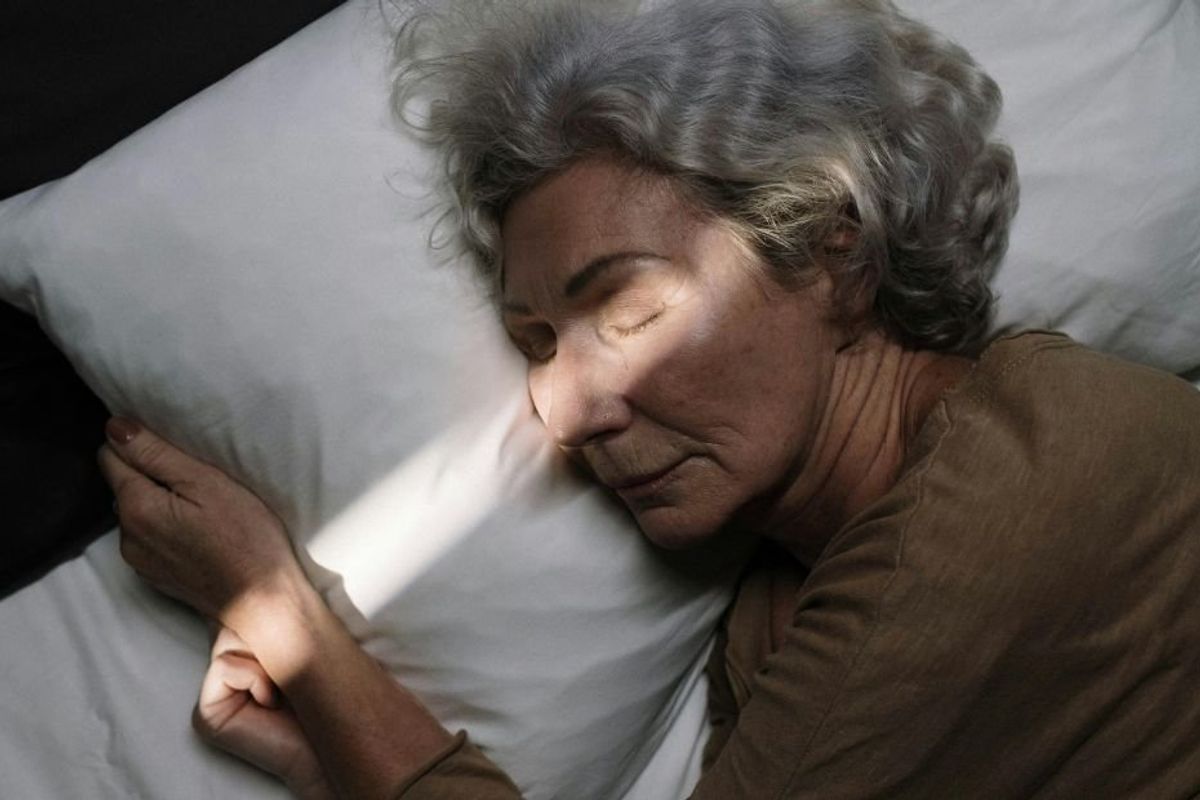 unconscious woman in a bed