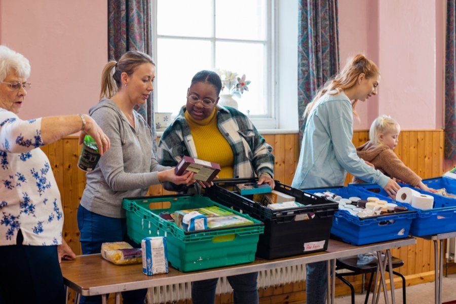 people organizing a food drive