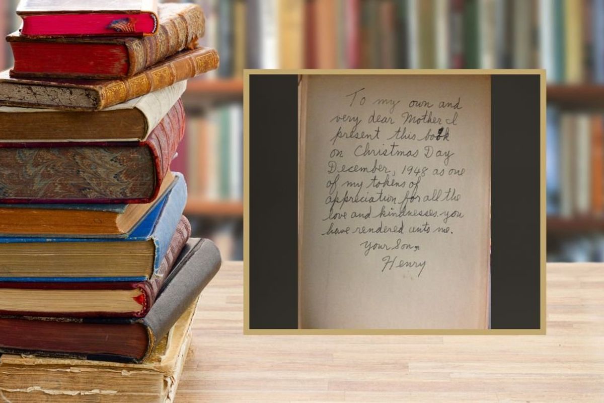 stack of old books and a book inscription