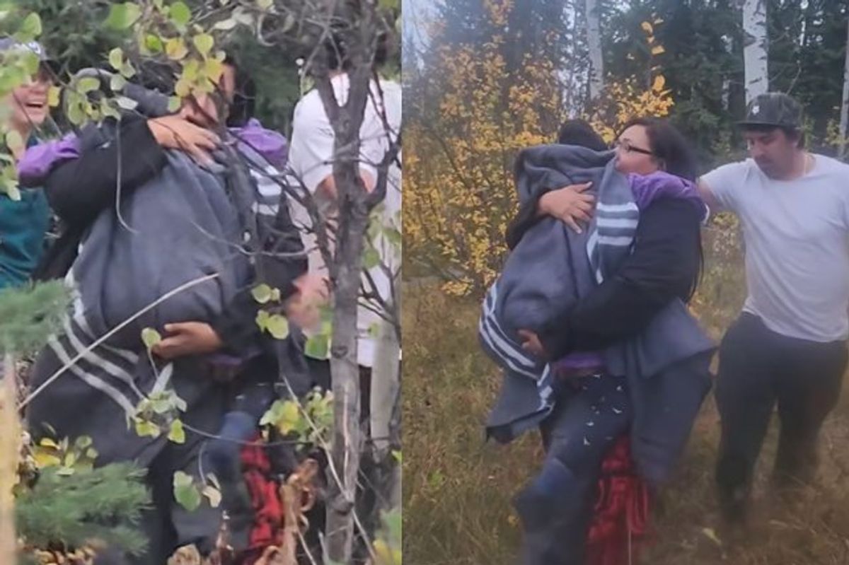 Mom holds rescued daughter