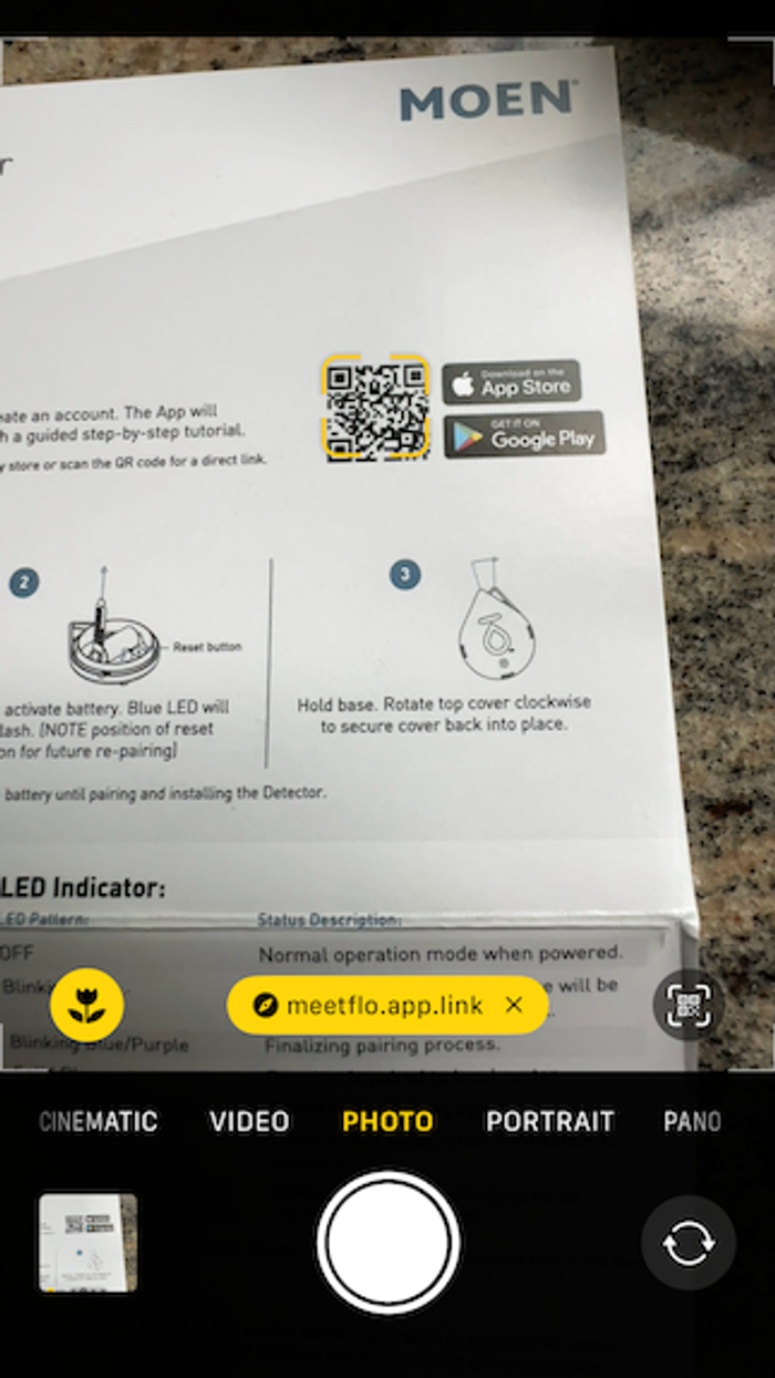 a photo of the QR code on the box to download the Moen App