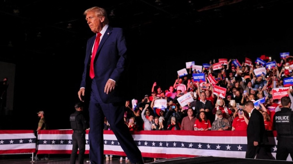 Trump Paces Onstage At 'Pretty Empty' Detroit Rally As Microphone Fails